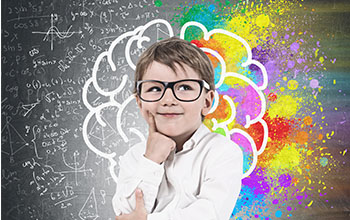 Little boy in glasses deep in thought, brain sketch, formulas and colorful patches in the background